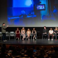 Group of people on stage for Q&A session