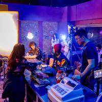Group of students working on a film set