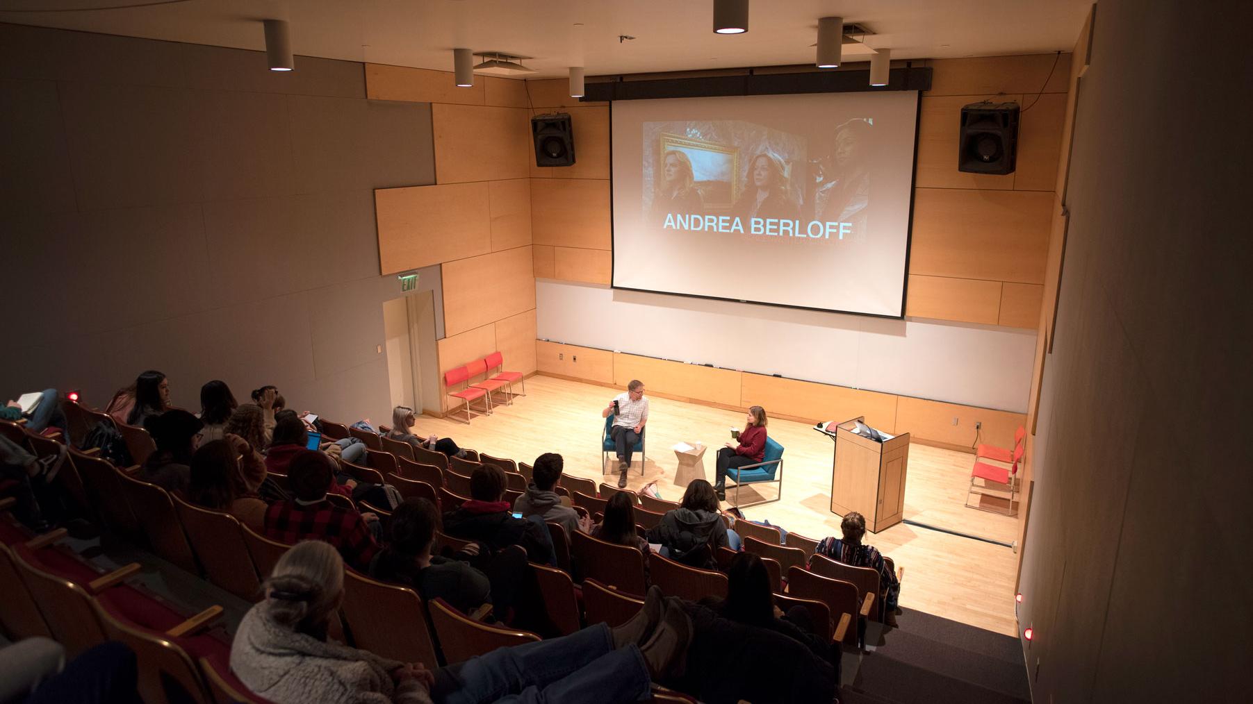 A group of people sitting in chairs in a lecture hall (Film Forum)