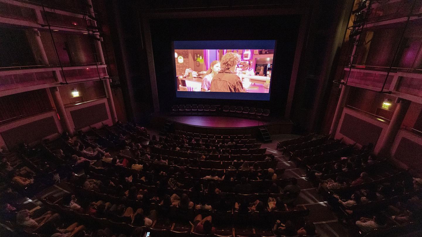 Kiplinger Theatre with a large screen on the stage
