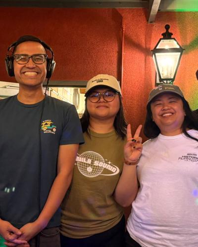 DJ Wee Jay, Thatflypinay, and January at a turntable