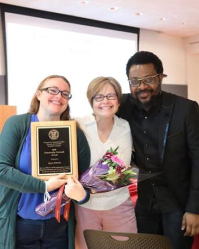 Award-winner Jayme Kilburn with Professor Sara Warner and Elaigwu Ameh
