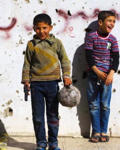 Young boys standing in the street