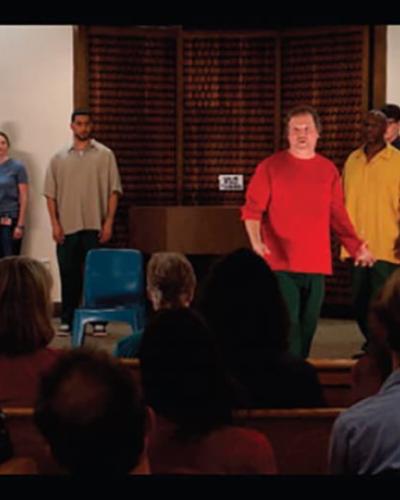 Nathan Powell performs a piece from An Indeterminate Life (2014) with the rest of the Phoenix Players. Courtesy of the Phoenix Players Theatre Group.